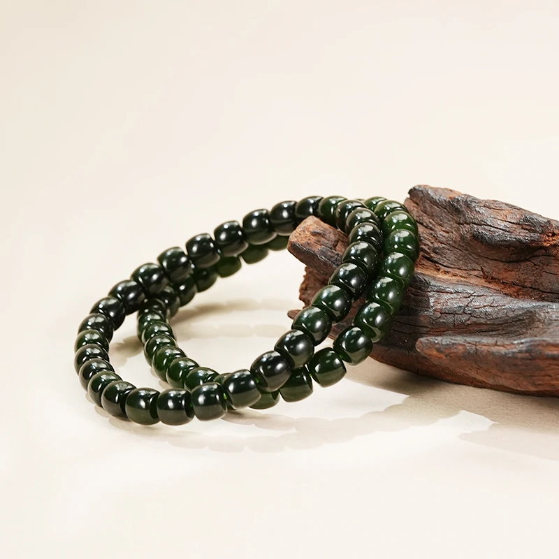 【鑫浩矿业】新疆和田玉-墨碧卡7-6直切极限弧手串一条多样性发一件