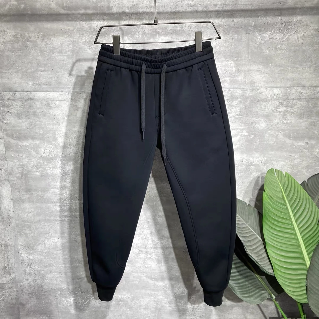 高品质休闲裤男冬季黑色简约纯色时尚百搭男卫裤宽松束脚裤九分裤