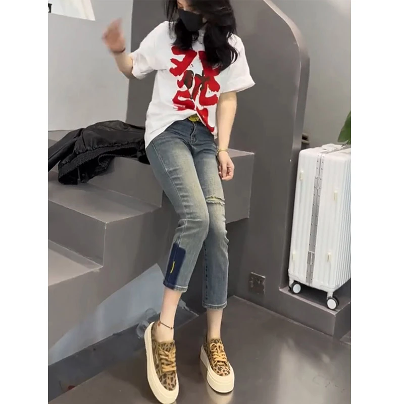 高档复古浅色破洞牛仔裤女2025新款夏季高腰显瘦修身八分烟管裤子