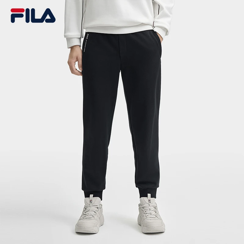 Fila/斐乐冬季加绒束脚裤新款男子宽松百搭针织长裤F11M449601F