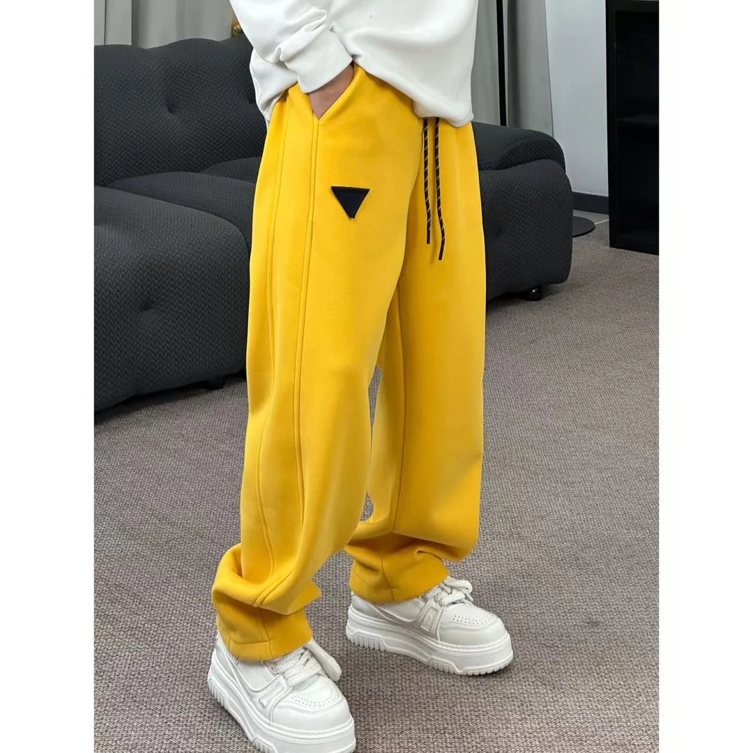 冬季新款时尚加厚磨毛细绒纯色净版结构款式弯刀微收直筒裤7218