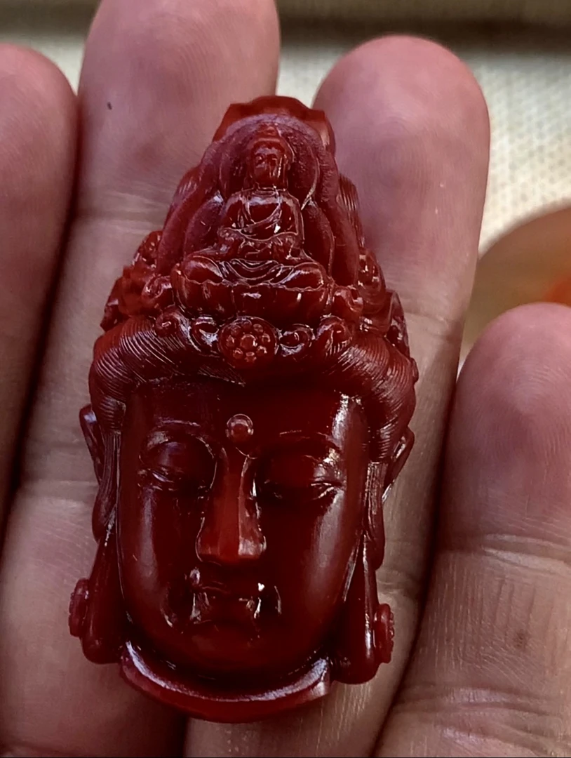 玫瑰红观音头雕件