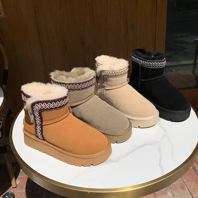 民族风牛角扣厚底雪地靴女短筒皮毛一体加厚防滑保暖东北雪地鞋
