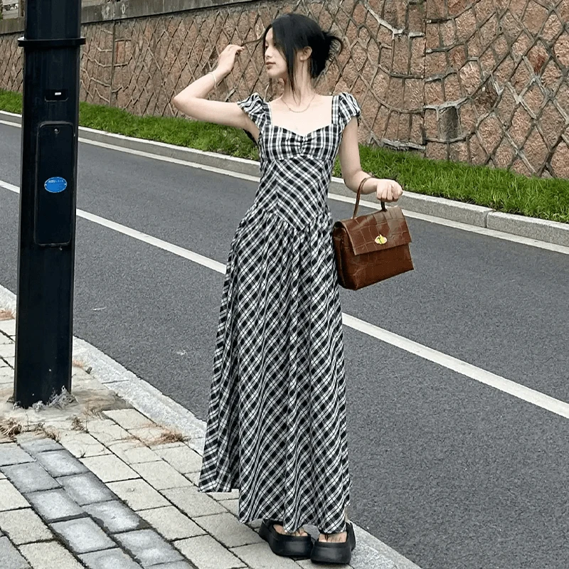 D393海边度假小飞袖格子连衣裙子女夏季2025新款显瘦长裙