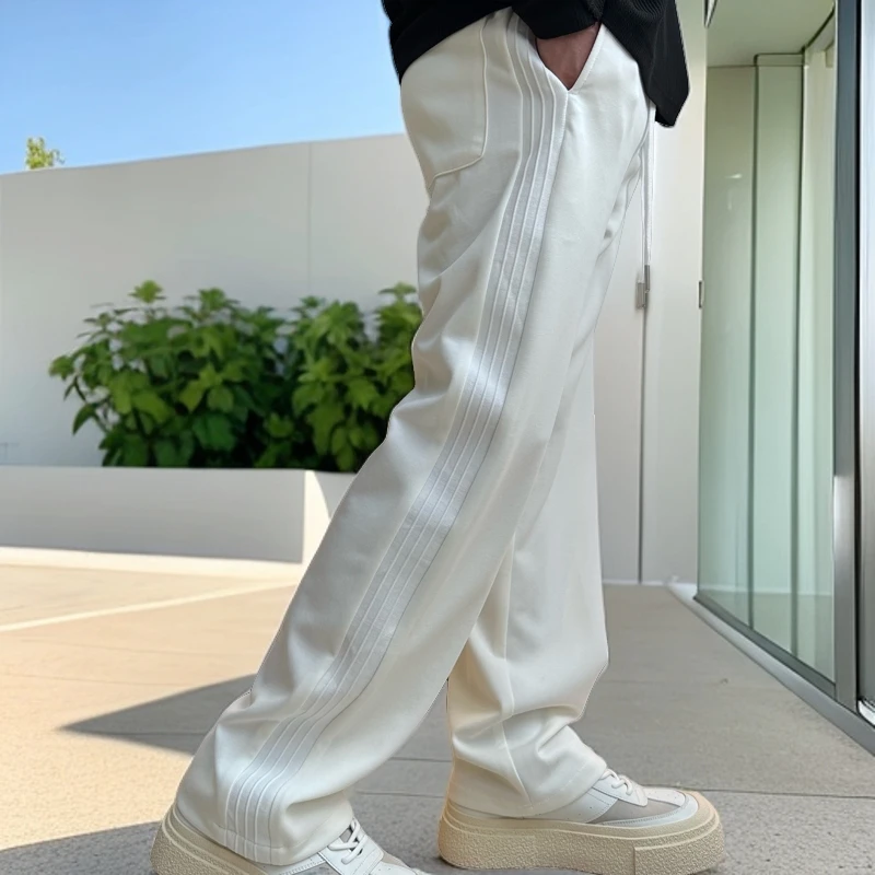 秋季宽松新款轻奢简约白色垂感直筒休闲裤男士运动百搭侧边拼接