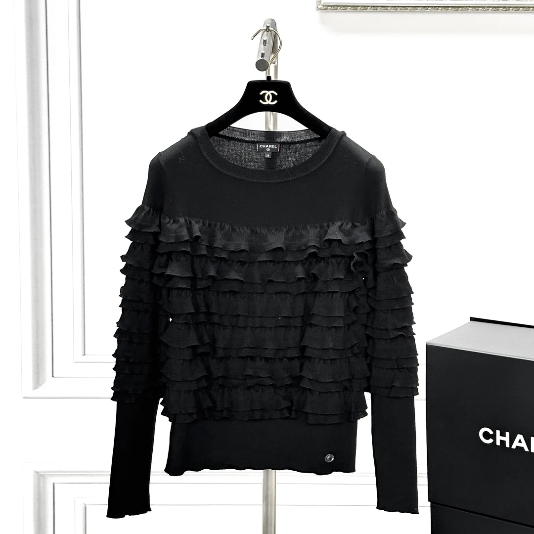 99新 Chanel/香奈儿 38码雪地系列黑色蛋糕上衣