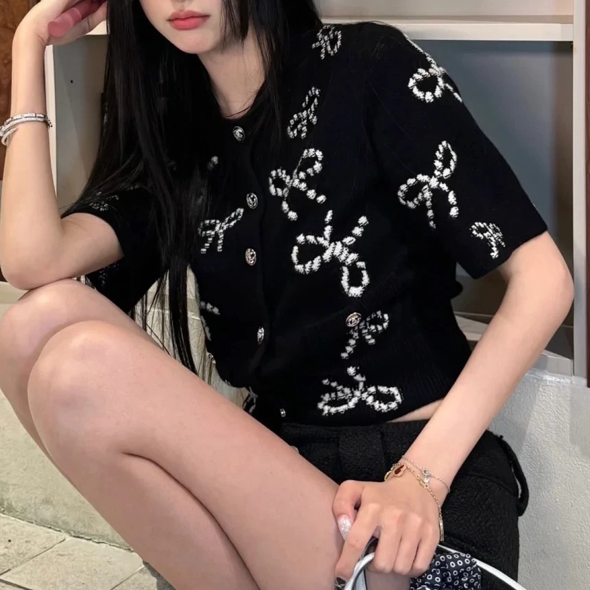 99新 Chanel/香奈儿 38码 24P黑色拼白色蝴蝶结针织短袖开衫