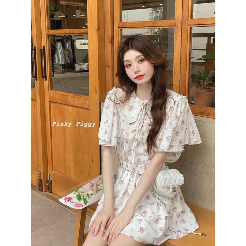 清八盖pinky piggy卡杰丽娜之花娃娃领小飞袖碎花上衣a字半裙套装