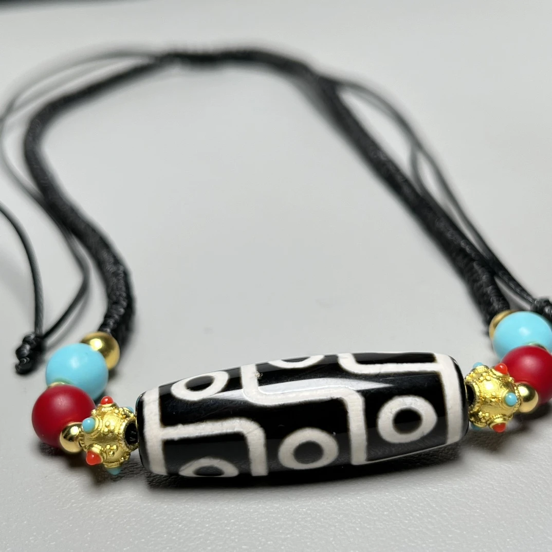 梵藏藏传玛瑙包浆黑白九眼天珠纯手工正宗天珠编织绳