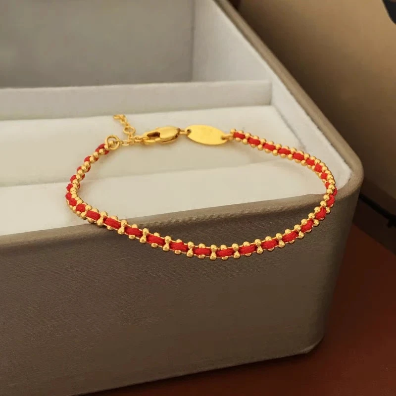 铜合金手链 毒饰高定   高端气质金豆绕绕编织红绳手链ZT6016