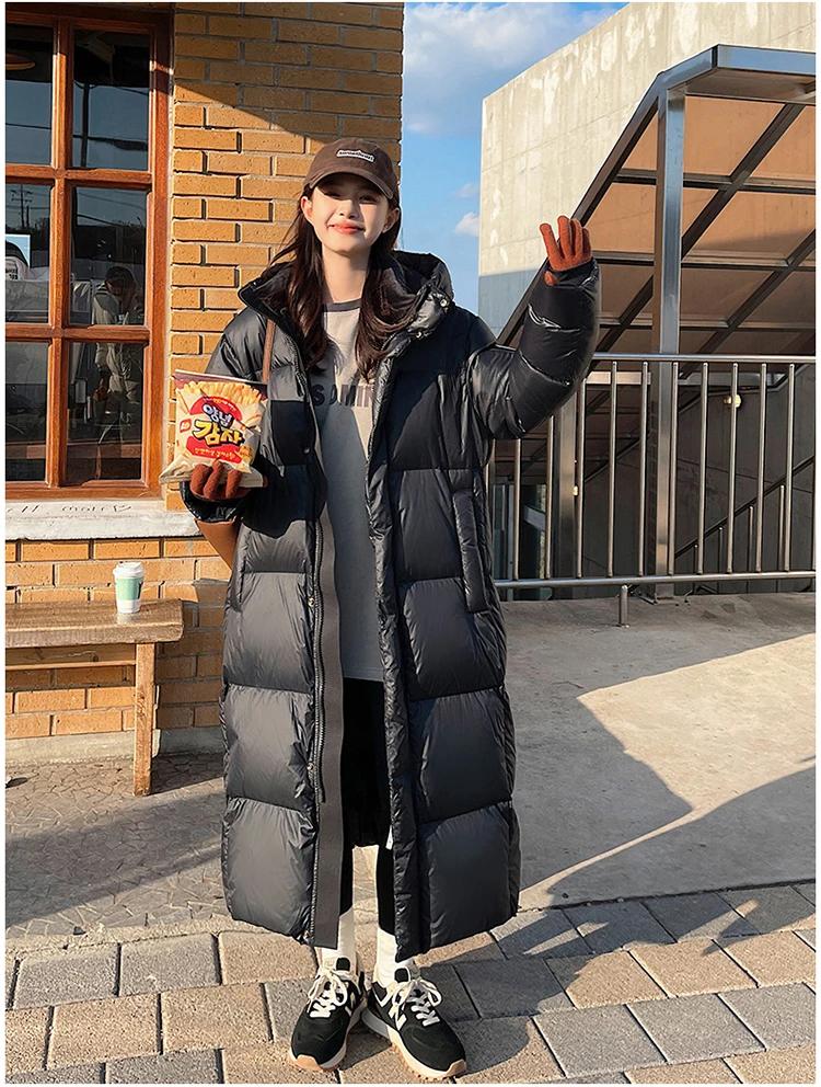 12喜黑金羽绒服女冬季2024新款韩版连帽宽松过膝加厚保暖长款