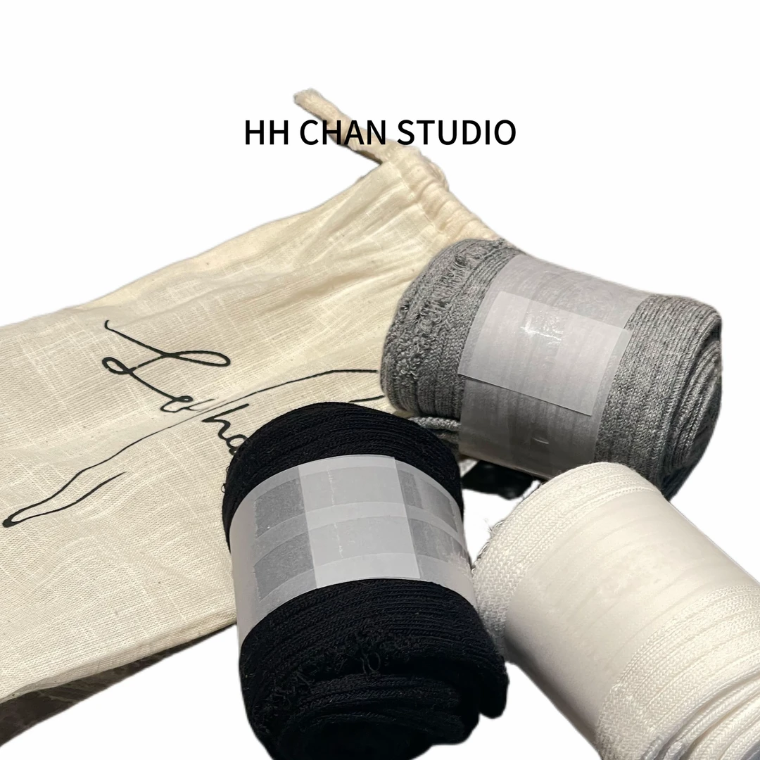 HH.CHAN"小破袜"复古手工磨破破洞黑白灰长袜HH53U38250