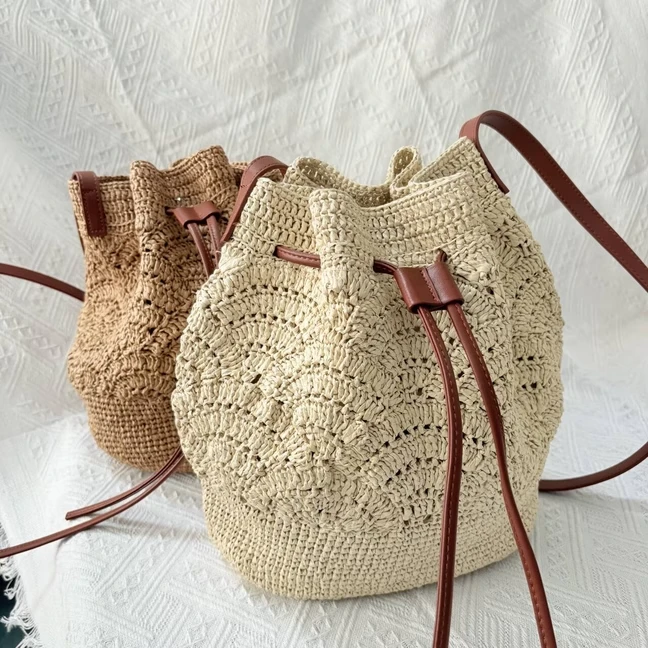 森系田园风编织包包2025新款小众设计草编夏天海边沙滩三亚斜挎
