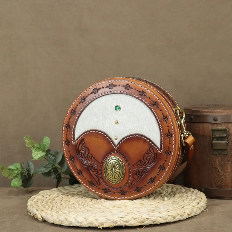 头层牛皮托斯卡纳真皮女士复古风小众雕刻休闲单肩斜挎孔雀翎包包