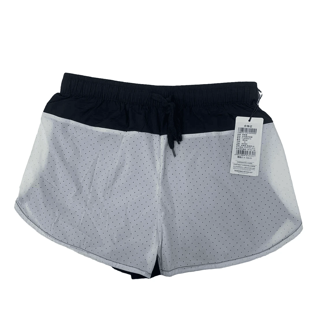 122 783215 女款户外运动休闲透气带内衬速干短裤
