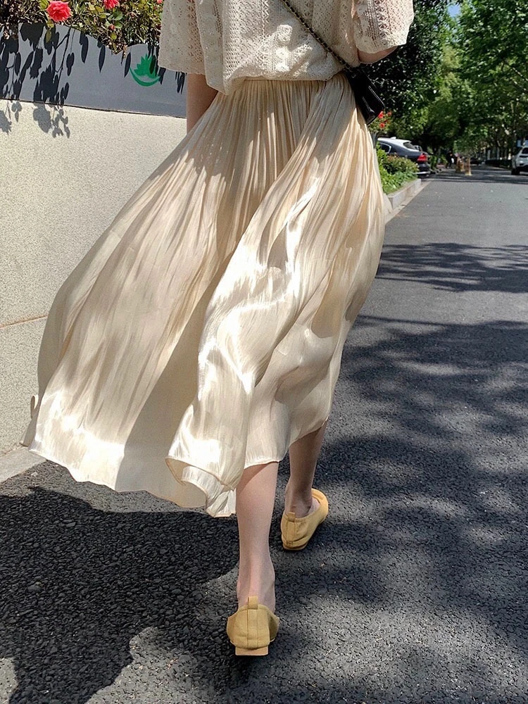 【集佳严选】24春夏设计感褶皱流沙珠光半身裙女
