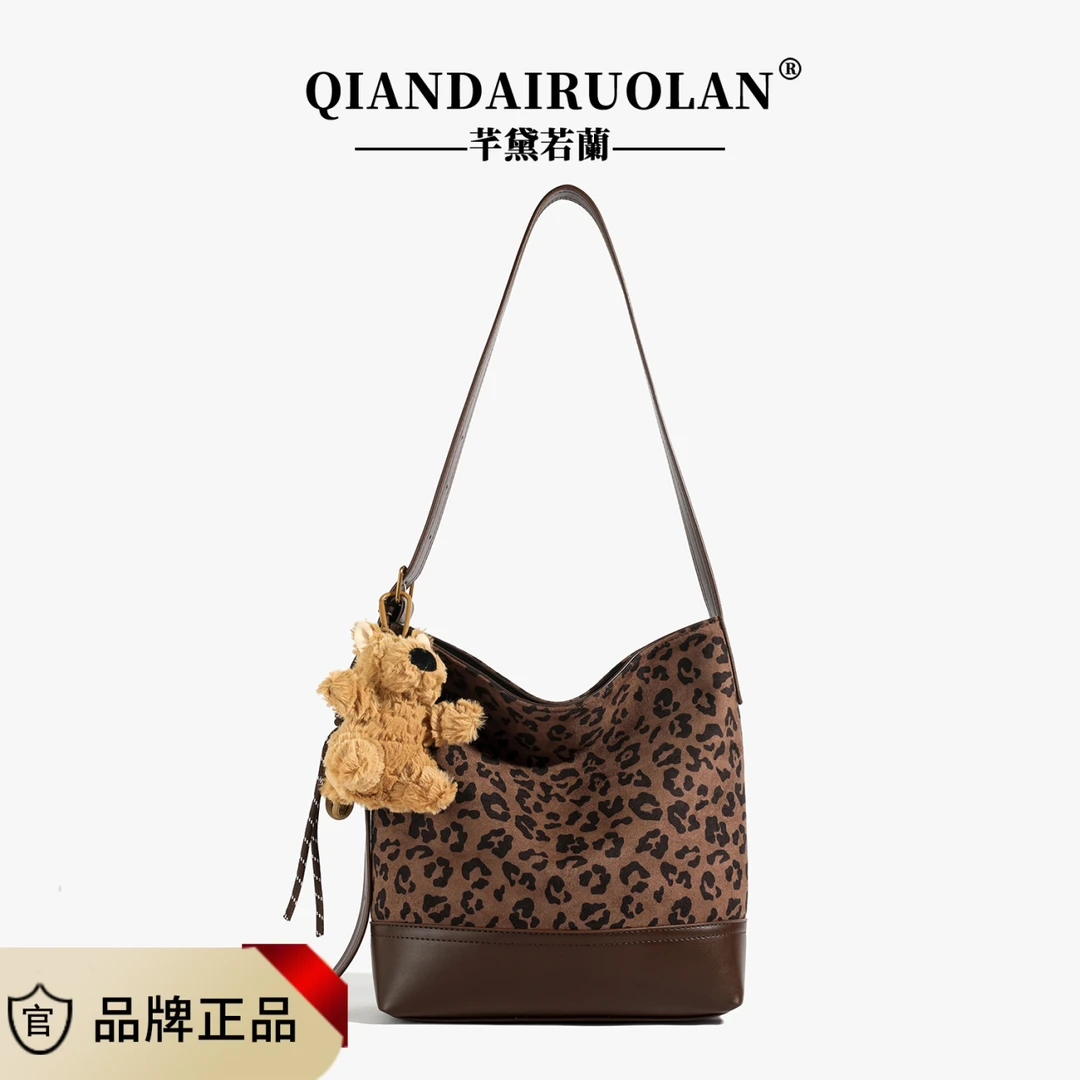 秋冬新款水桶包经典百搭豹纹单肩包时尚女士设计师潮流腋下包提花