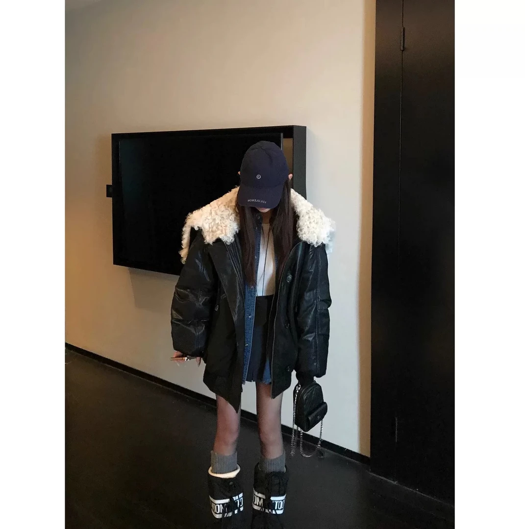 时尚潮流超酷的黑色大翻领女冬季牛角扣宽松外套