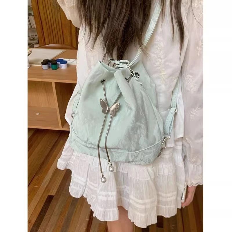 薄荷曼波绿双肩背包包女2025新款潮韩国水桶包百搭ins单肩腋下包