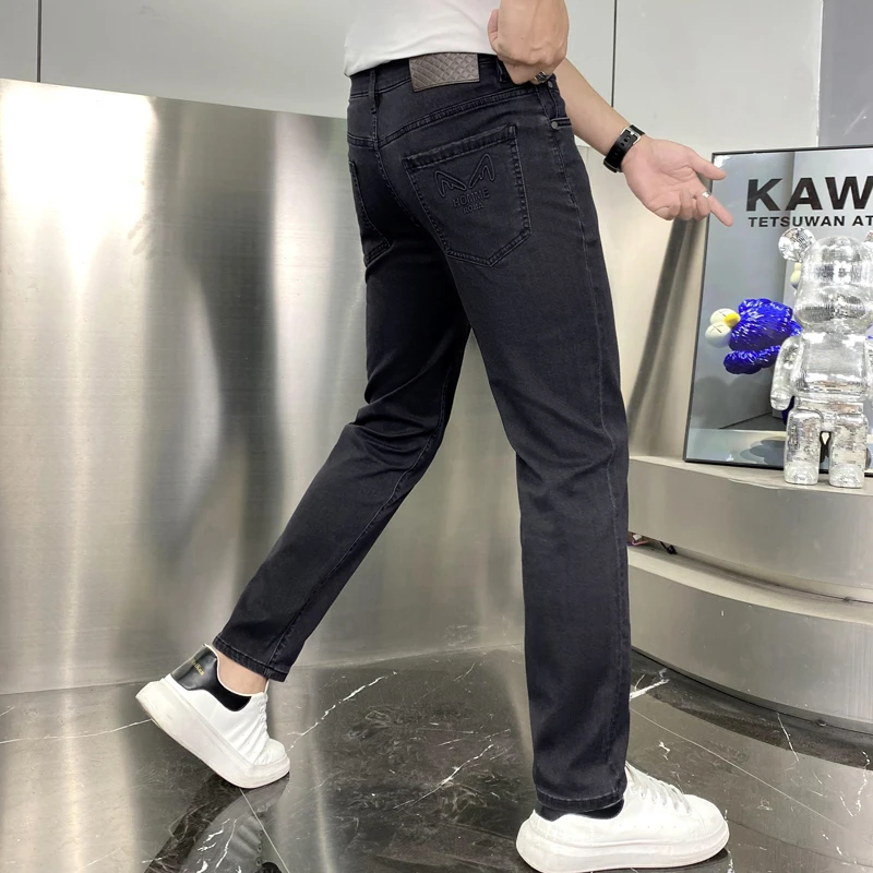 2023新款欧版烟灰色软牛仔裤男款夏季薄款修身显瘦弹力小直筒裤子