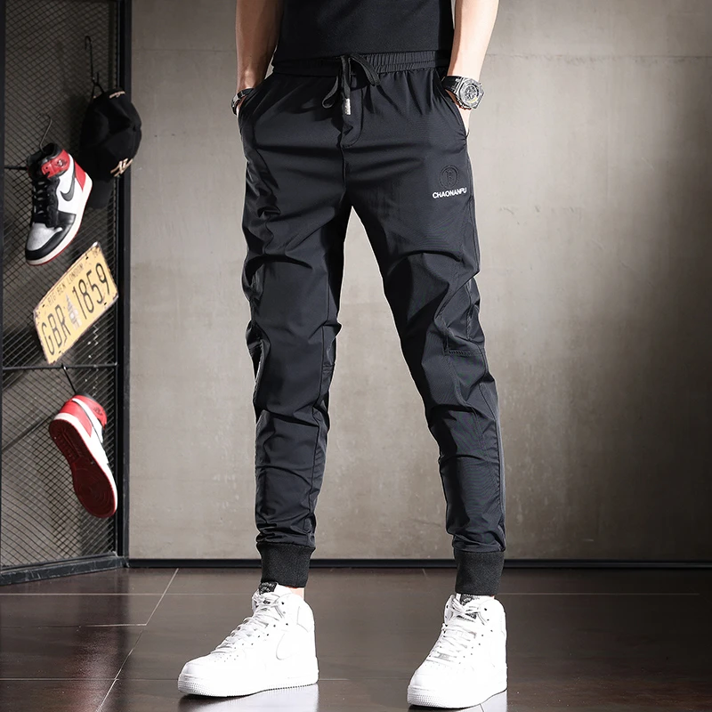 夏季超薄款休闲裤男修身小脚速干冰丝裤子男士大码束脚运动裤弹力