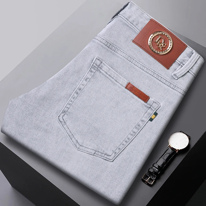 九牧香港高端夏季薄款冰丝莱赛尔牛仔裤男士修身小脚商务休闲长裤