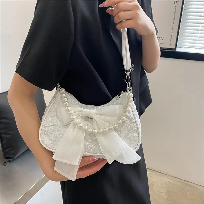 冬天冬季质感小众蝴蝶结包包女夏2022新款潮时尚珍珠腋下包百搭包