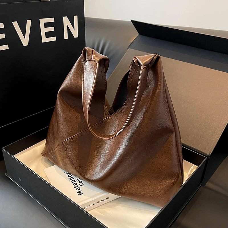 复古包包女春夏2025新款时尚简约高级感单肩包休闲百搭通勤托特包