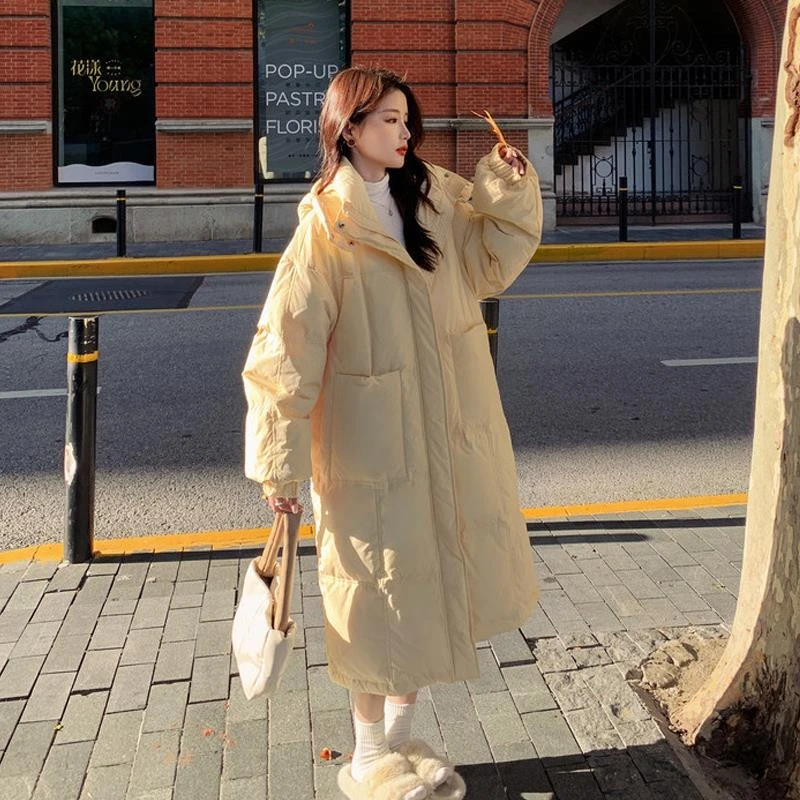 长款棉衣奶淡黄色羽绒服女中长款冬季新款连帽加厚过膝小个子