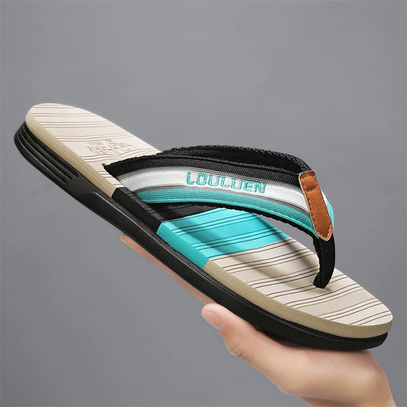 夏季男士防滑字拖鞋人字拖时尚休闲外穿个性夹脚沙滩涉水鞋拼色新