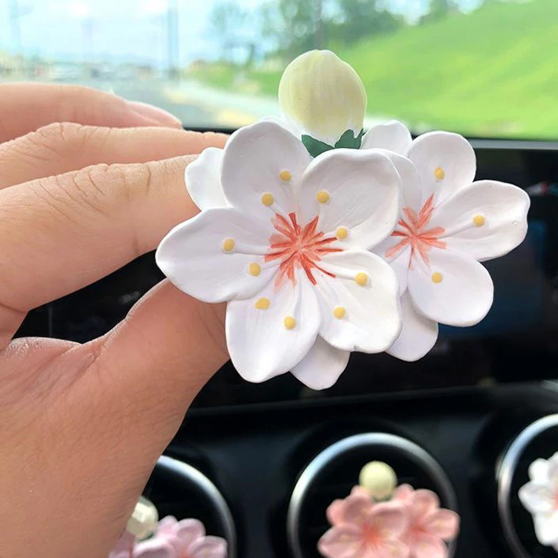 INS风夏日招桃花可爱桃花空调出风口夹组合车载香水香薰扩香石