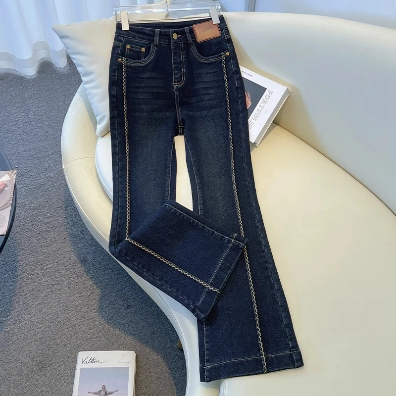 深蓝色修身喇叭裤女高腰显瘦2025新款秋冬加绒加厚弹力微喇牛仔裤