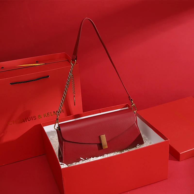 红色新娘结婚腋下包包2025新款高级感小众通勤斜挎法棍包日常可用