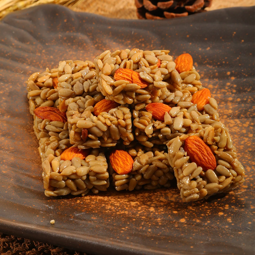 巴旦木瓜子仁酥网红休闲小零食香脆葵花籽仁混合坚果酥【独立包装】