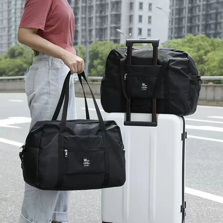 旅行收纳袋防水衣物整理袋便携式大容量手提包套行李箱拉杆单肩包