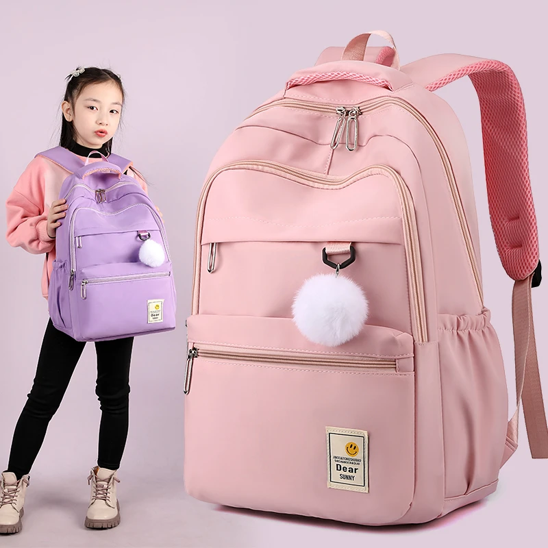 书包小学生女三到六年级初中生大容量简约轻便减负多层防水双肩包