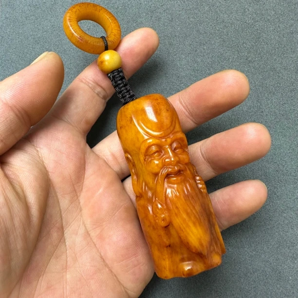 油润牦牛骨雕刻寿星手把件