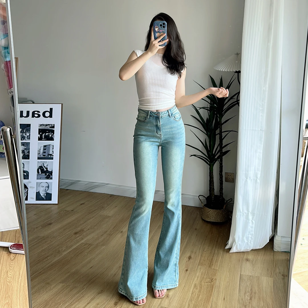 张百亿高腰紧身牛仔裤显瘦修身微喇叭弹力蓝色时尚春游厚款