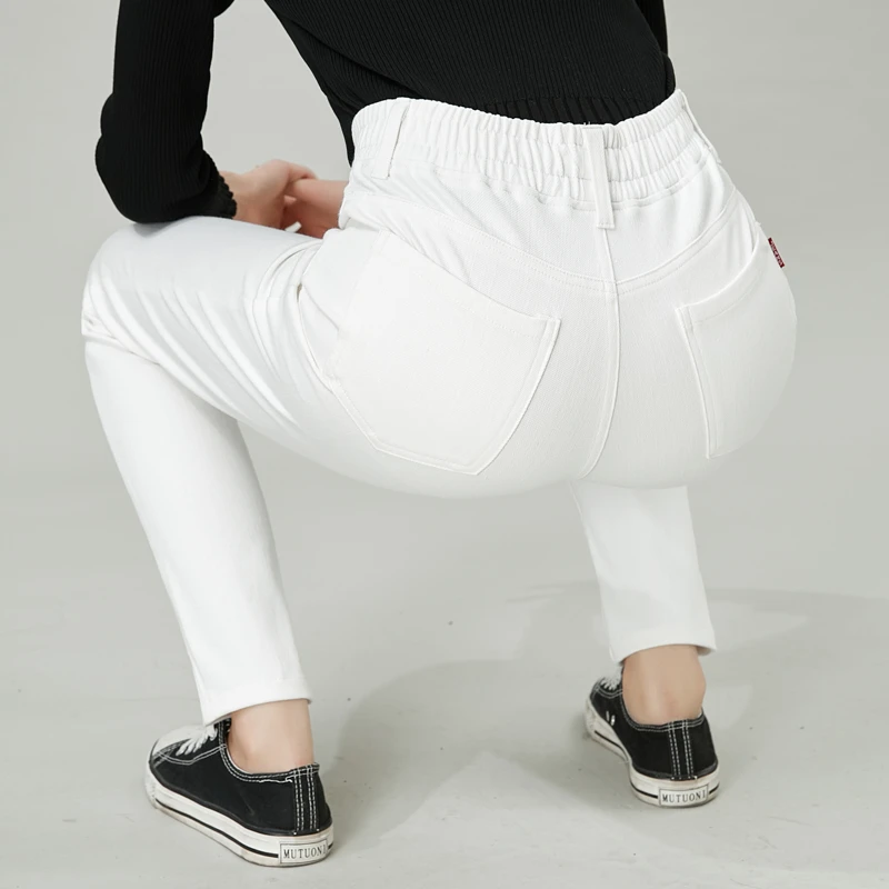 白色松紧腰牛仔裤女高腰大码小脚长裤高弹力胖mm显瘦九分裤舒适