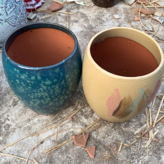 紫砂花盆口16。高21。