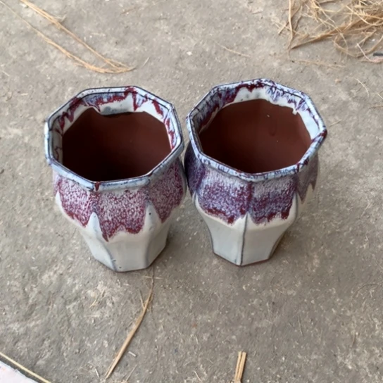 紫砂花盆口12。高18。