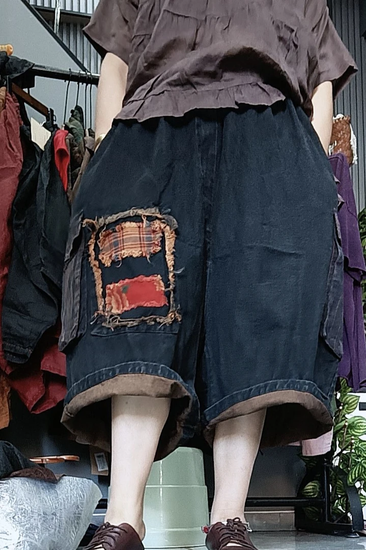 磨白水洗做旧兰黑色贴布九分阔腿牛仔吊档裤