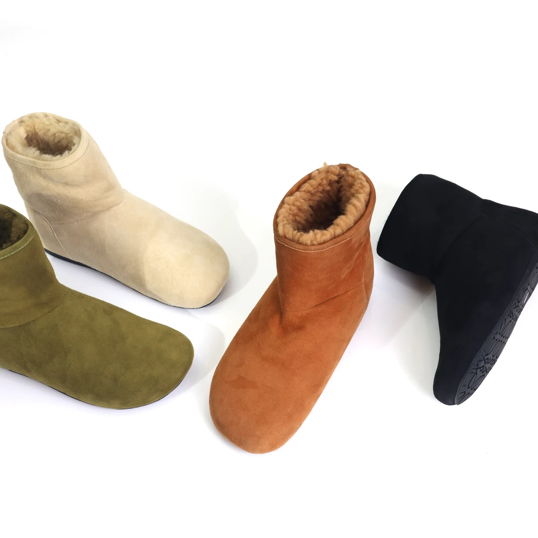 时尚保暖雪地靴女皮毛一体冬季保暖真毛绒短筒勃肯女靴1031-10