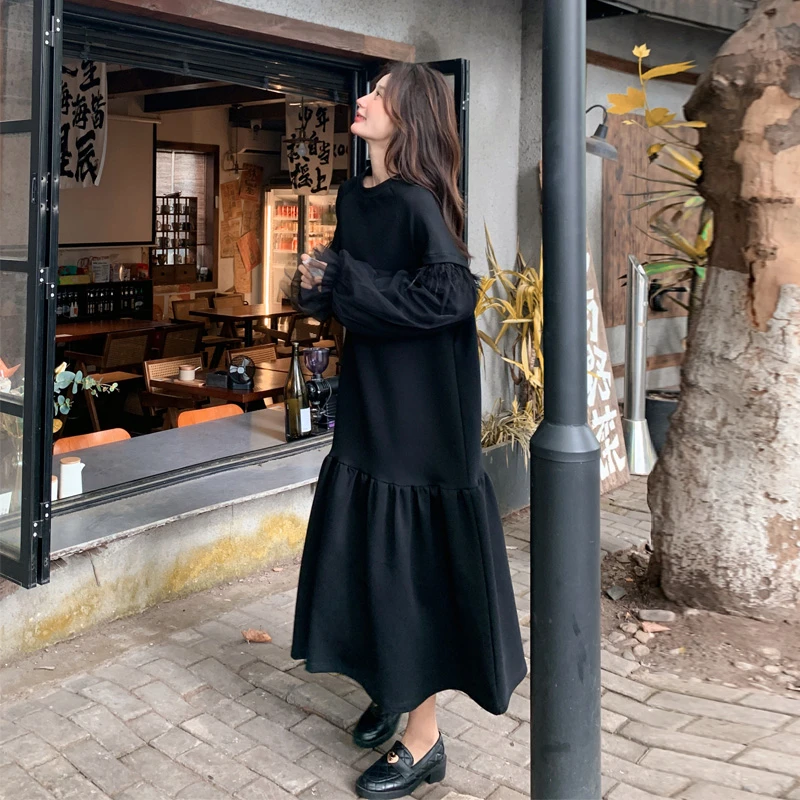 黑色连衣裙女春秋款2025新款别致独特超好看慵懒风鱼尾拼接卫衣裙