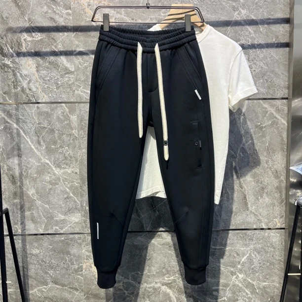 口袋装饰加厚休闲裤 定织涤棉混纺黑色卫裤 秋冬季修身小脚保暖裤