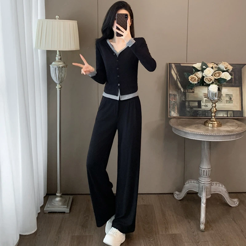 新款时装6596实拍图现货呜呜春秋新款设计感假两件开衫上衣高腰松