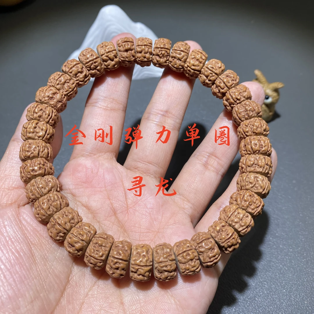 寻龙小金刚弹力单圈老树籽褐色皮质规圆单圈手串手持精品文玩