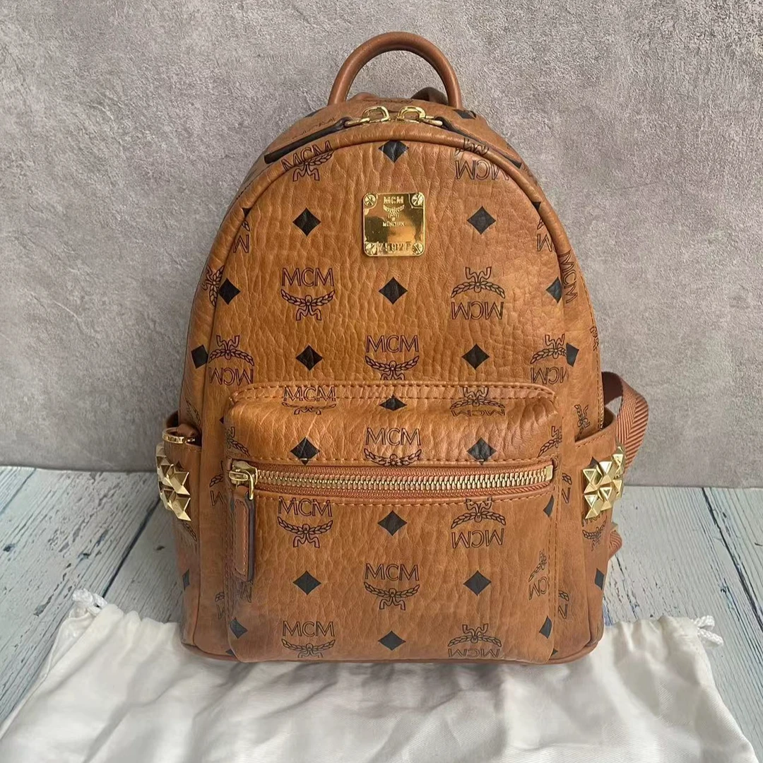 99新 MCM mcm干邑色迷你号双肩包24年款