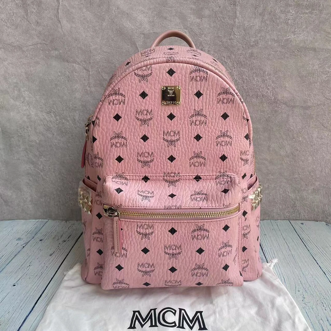 99新 MCM mcm樱花粉中小号双肩包98新