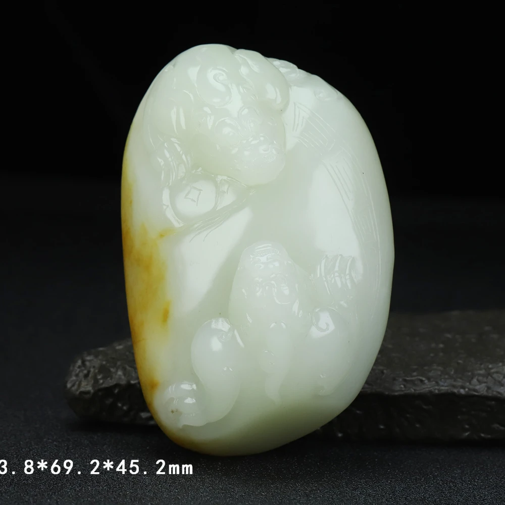 F59海川拍卖和田玉手把件